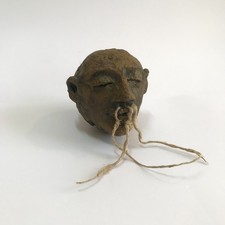 Reproduction tête réduite