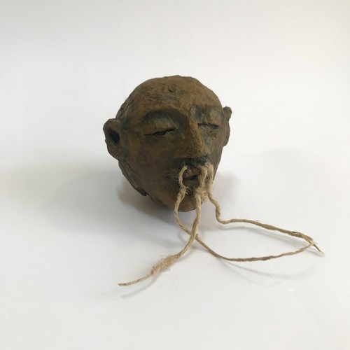 Reproduction tête réduite
