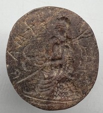 Timbre en pierre homme poisson