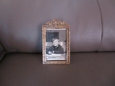 old brass frame topped with a knot to lay 12.5 cm high