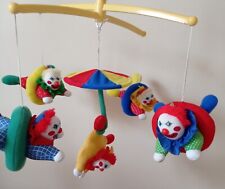 mobile musical tournant clowns de couleurs vives