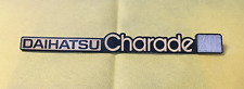 DAIHATSU CHARADE XTE- CAR BADGE / EMBLEM - 100 X 32 MM