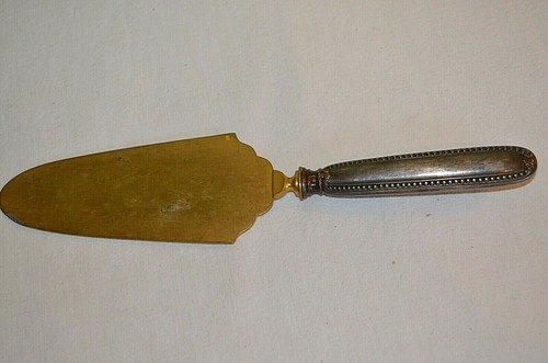 Pelle tarte manche fourré - tarte,