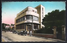 Old postcard Istres, street with modern building and vintage cars 