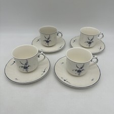 4 tasses a café avec soucoupe