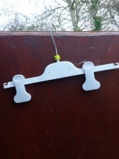 Petits CINTRES PLASTIQUE GRIS  POUR PANTALON  OU JUPE 12 PCS