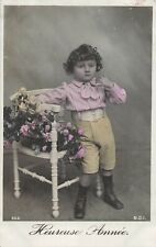 CP HAPPY YEAR BOY SENDING KISS ROSES ON SMALL CHAIR