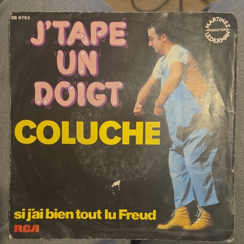 Coluche tape doigt si - coluche,