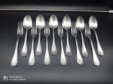 12 couverts de table en métal