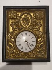 black drill pendulum clock