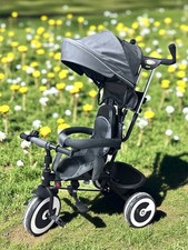 VÉLO TRICYCLE pour enfant équipé d’un guidon et d’une poignée parentale