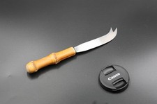 Couteau à fromage manche