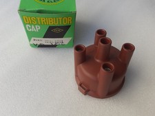 Bouchon de distributeur pour