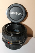 Minolta MD 50 mm 1,7 + bouchons