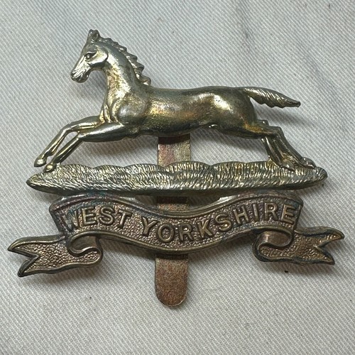 Insigne casquette west - de,