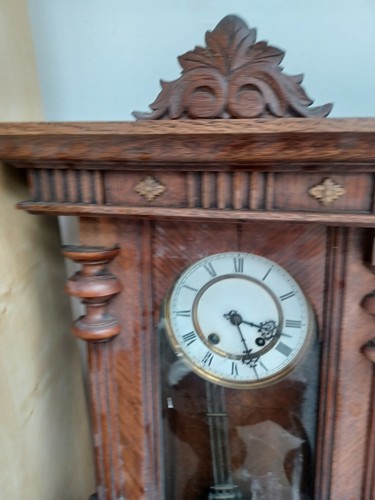 Pendule murale bois marron