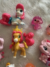 Nine little pet shop figurines
