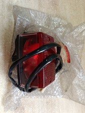 UN FEU ARRIERE ORIGINE NEUF