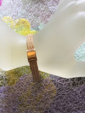 Bracelet maille serpent doré Vintage en très bon état.