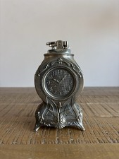 Briquet en forme d’Horloge