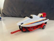 Majorette - racing team outboard boat on trailer (14 cm long)