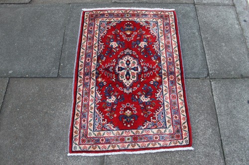 Tapis oriental laine fait - en,