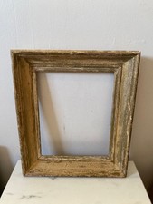 Ancien cadre en bois sculpté