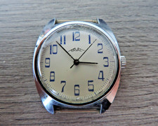 montre mécanique vintage inox
