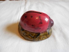 ANCIENNE TIRELIRE EN BARBOTINE