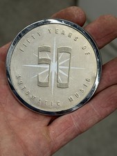 AMi “J” Jukebox Grill Badge