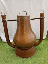 ancien chauffe bain en cuivre