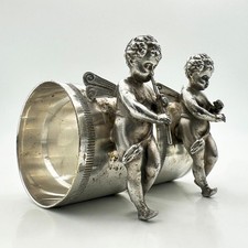 ANTIQUE PAIR GERMAN WMF NOVELTY CHERUB NAPKIN RINGS