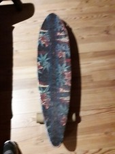 longboard  très peu utilisé
