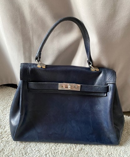 Sac main cuir - en,
