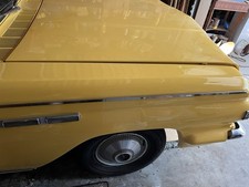 1963 Yellow Buick Skylark Convertible Less 90,000 miles.Garaged After Restored.