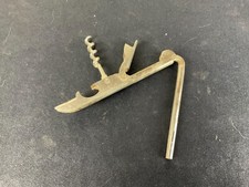 old multifunction corkscrew lemonades opener can & sardines