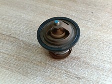 UN THERMOSTAT DE CULASSE MOTO