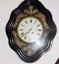 horloge oeil de boeuf avec