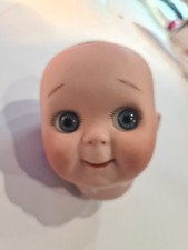 Tête en porcelaine Poupée