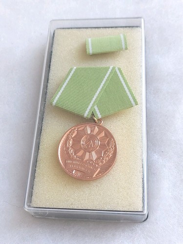 Une médaille allemande après - une,