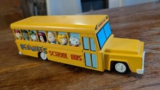 TIRELIRE BUS SCOLAIRE SNOOPY