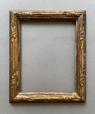 Cadre en bois et stuc doré