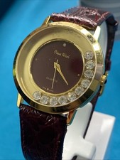 Pierre Nicol Womens Gold Red Flosting Gem Quartz Watch New Battery