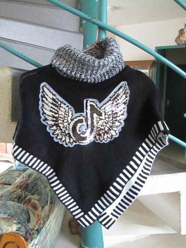Poncho noir taille 6ans marque - taille,