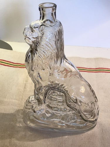Lion ancienne bouteille verre - ancienne,