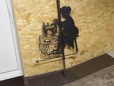 Old sign, wrought iron, weather vane, sewing machine, seamstress, haberdashery, 1930