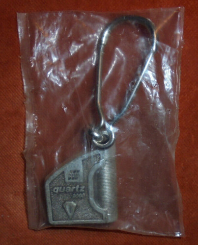 Porte clés métal - métal, oil
