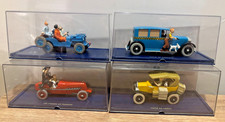 4 VOITURES SERIE TINTIN 1/43  en amérique, congo, cigare pharaon, objectif lune