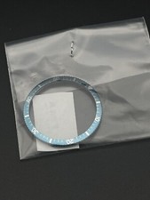 Lunette de montre Yema bleu anodisée vintage NOS stock ancien horloger