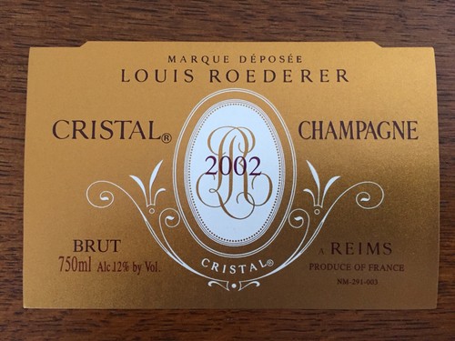 Une étiquette champagne - une,